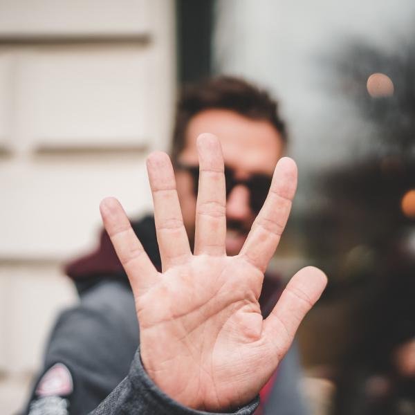 Number 5 shown with hand